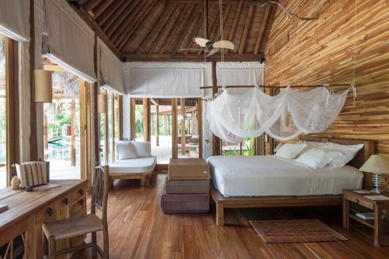 Shaded outdoor living pavilion at Villa 42, Soneva Fushi, photographed by Richard Waite