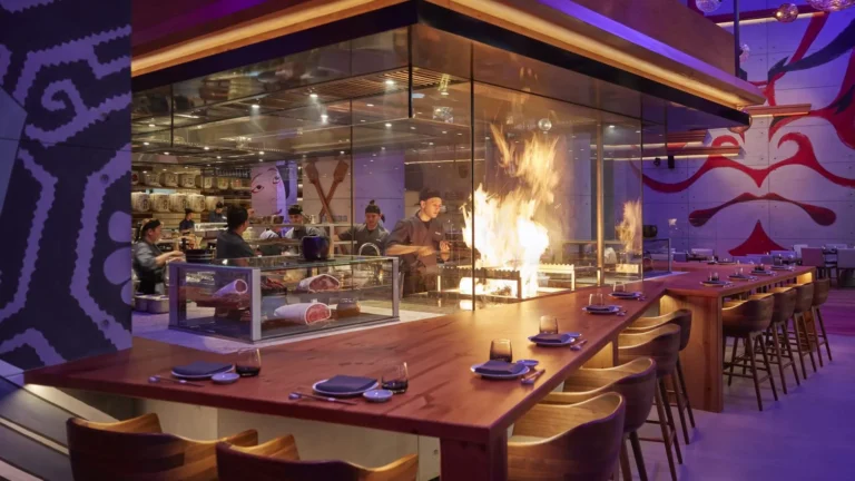 Interior of Netsu Japanese live-fire restaurant at Mandarin Oriental Jumeira, Dubai, with cedar wood and open-flame grill