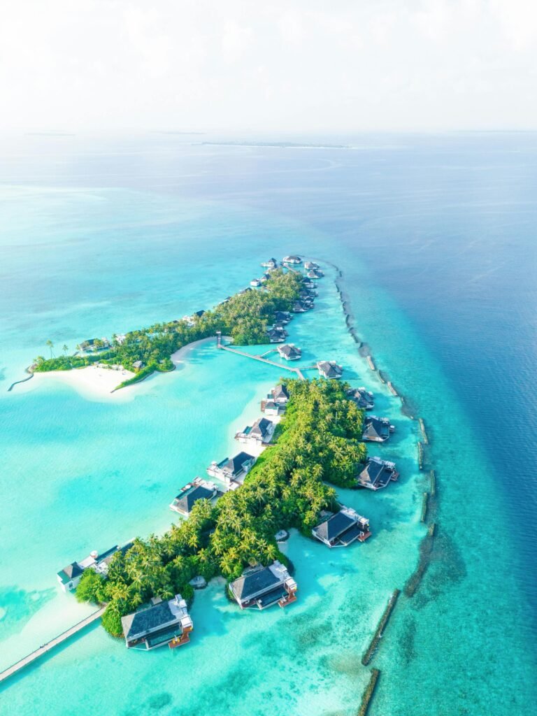 Interior of an overwater Water Villa with sea views at Cheval Blanc Randheli