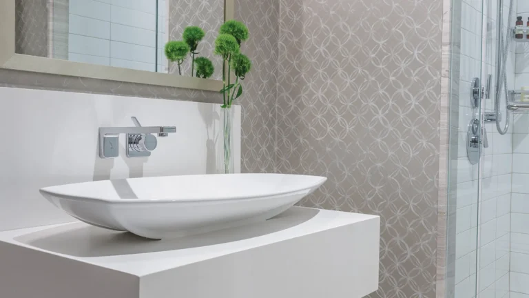 Guest bathroom at Four Seasons Resort Orlando with a vessel sink and glass-enclosed walk-in shower