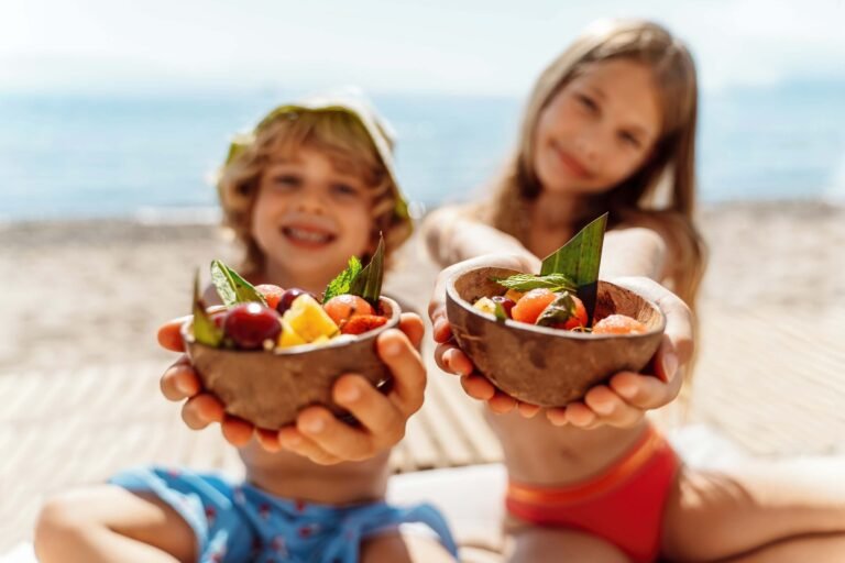 Smiling children enjoying activities at an Ikos resort kids club