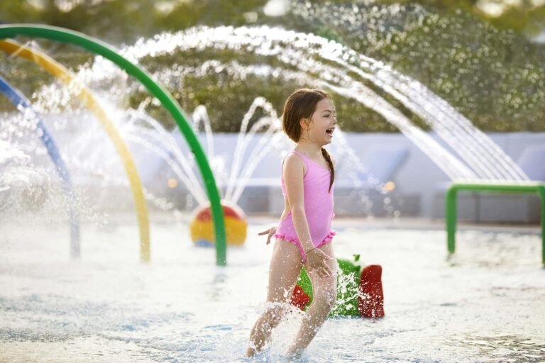 Children playing in a kids play area at an Ikos resort