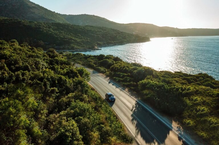 Children driving miniature electric cars on a MINI drive adventure at an Ikos resort