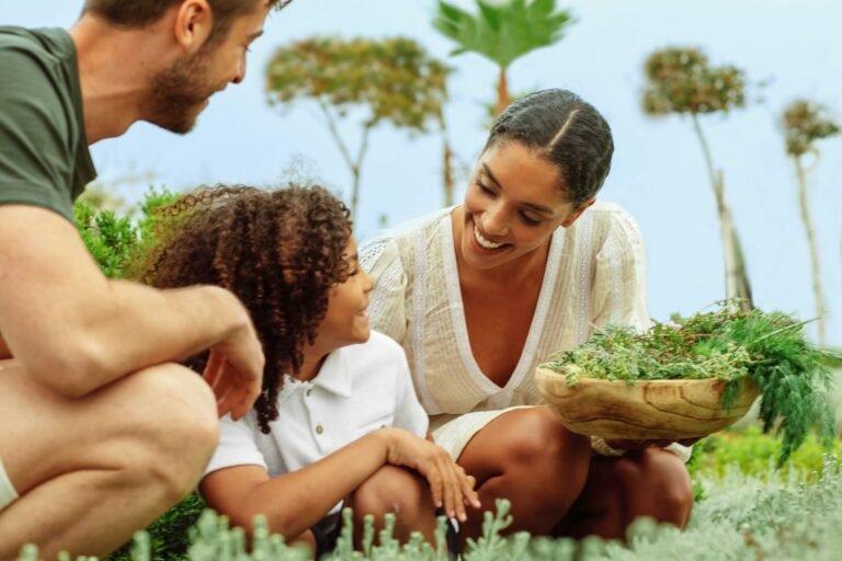 Family with children exploring the herb garden at an Ikos resort