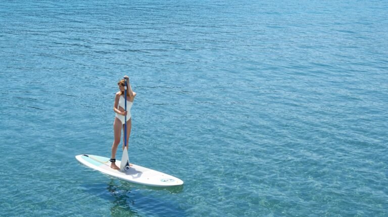 Stand-up paddleboarding in the sea at Ikos Dassia