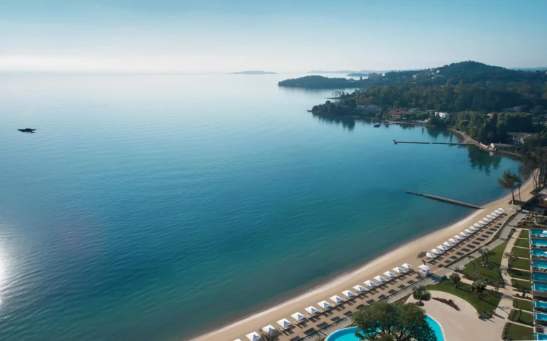 Aerial view of Ikos Dassia resort along its beach on the Ionian coast of Corfu