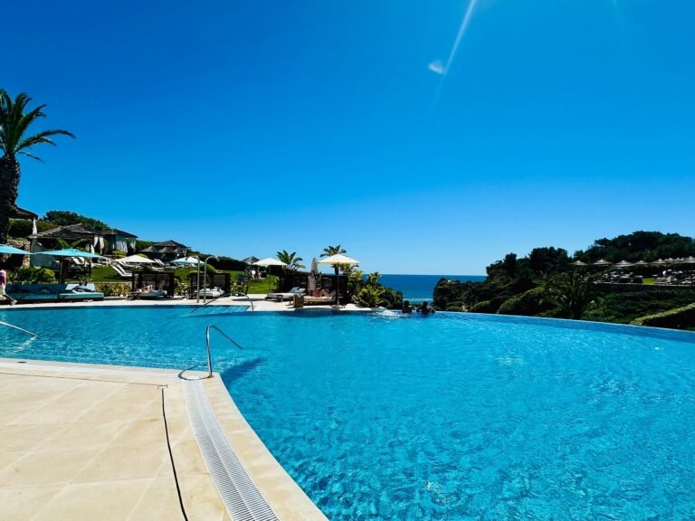 Infinity pool meeting the Atlantic horizon at Vila Vita Parc