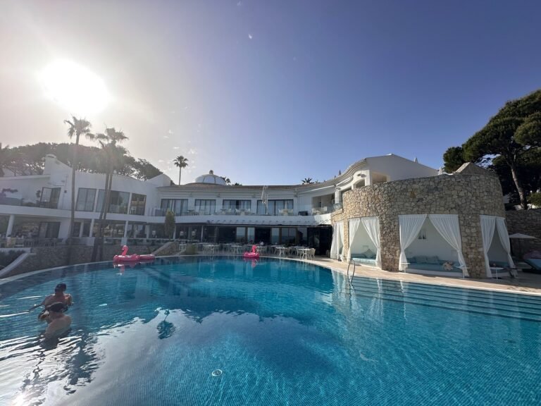Main resort pool with cabanas and pool floats at Vila Vita Parc
