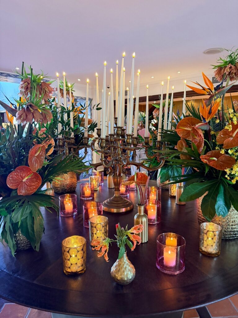 Floral and candle table arrangement in a Vila Vita Parc lounge