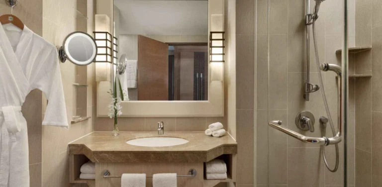 Garden Wing Deluxe Room bathroom at Shangri-La Rasa Ria with soaking tub and marble finishes