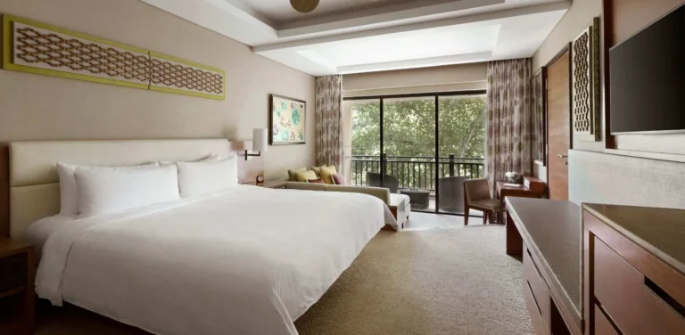 Garden Wing Rainforest Room at Shangri-La Rasa Ria with king bed and rainforest view
