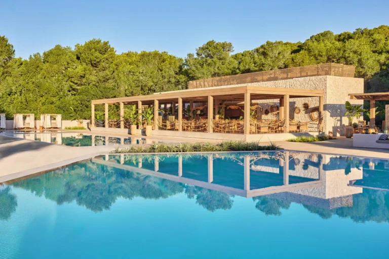 Beach Club area beside one of Ikos Porto Petro's sheltered Mediterranean coves