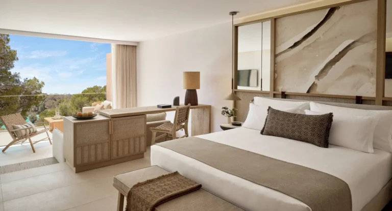 Deluxe Junior Suite with garden view and contemporary Mediterranean interior