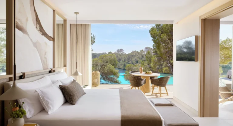 Deluxe One Bedroom Suite with contemporary interiors and Mediterranean sea view