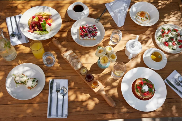 Breakfast and sharing dishes served in a Mediterranean resort setting