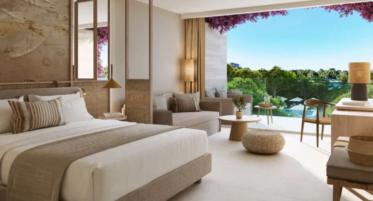 Junior Suite overlooking a swimming pool at Ikos Porto Petro