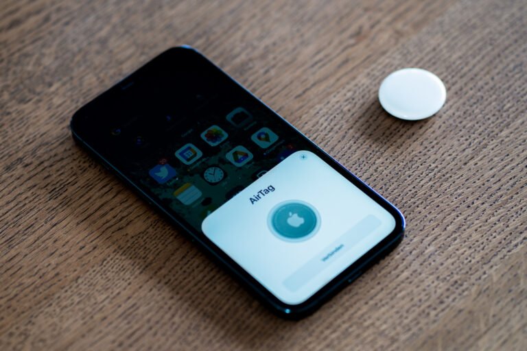 iPhone 12 Pro Max screen showing AirTag initial setup in Find My app