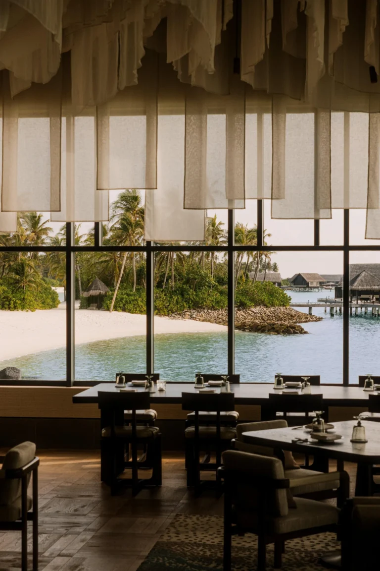 Tapasake interior wide angle at One&Only Reethi Rah, overwater dining room above the lagoon