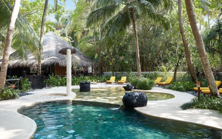 Children engaged in a guided activity at One&Only Reethi Rah kids club, Maldives