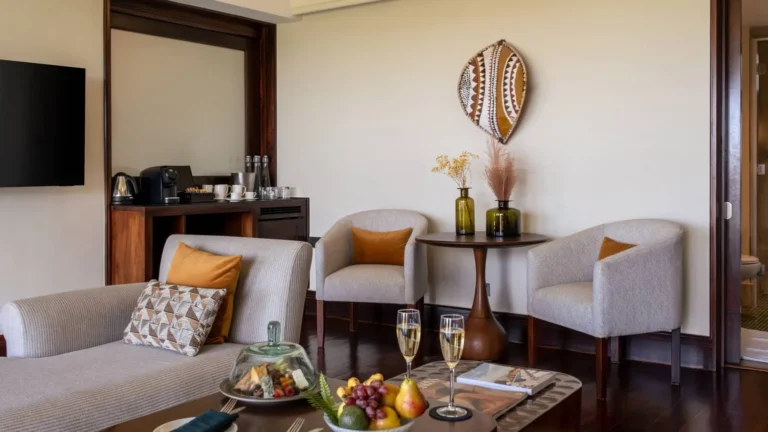 Pool loungers and view at Four Seasons Safari Lodge Serengeti