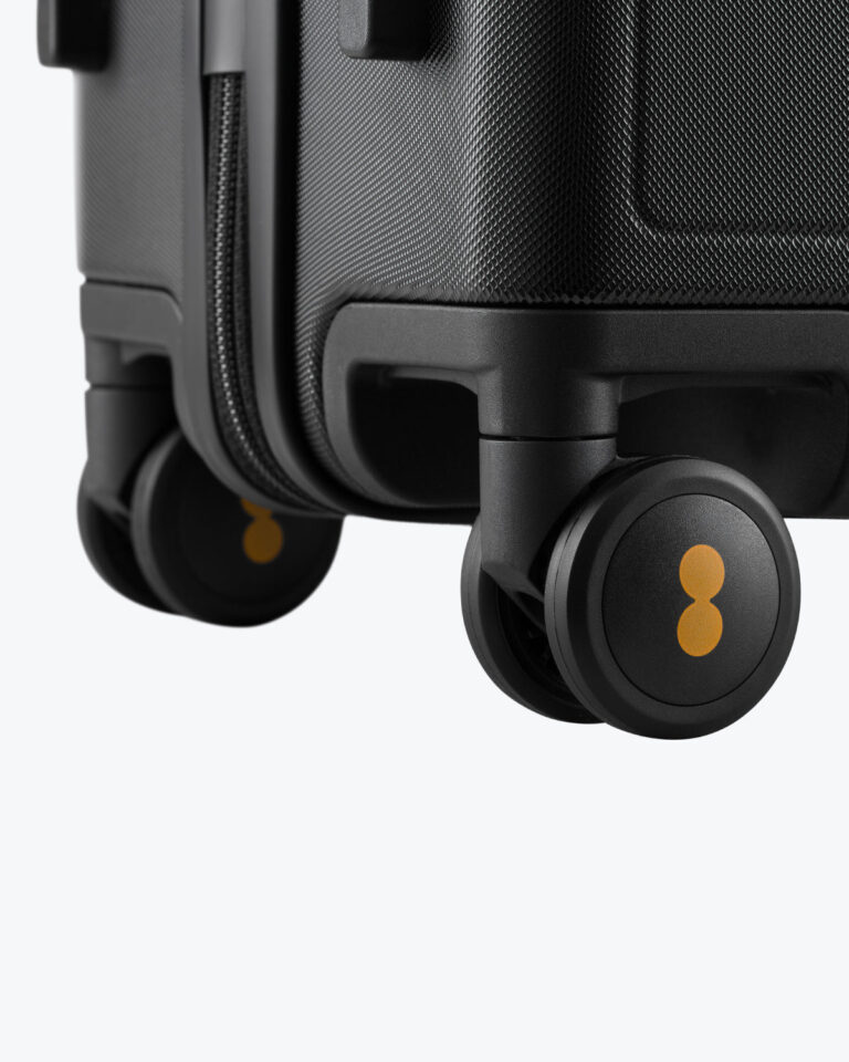 Close-up of the LEVEL8 Luminous Textured 360-degree silent spinner wheels on a black hardshell case