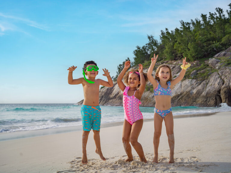 North Island, Seychelles — Experience the Island kids playing on beach