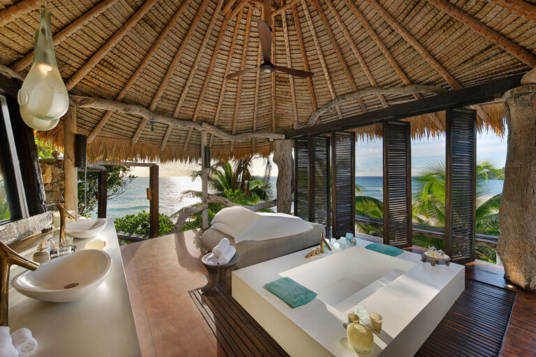North Island, Seychelles — Villa North bathroom and view