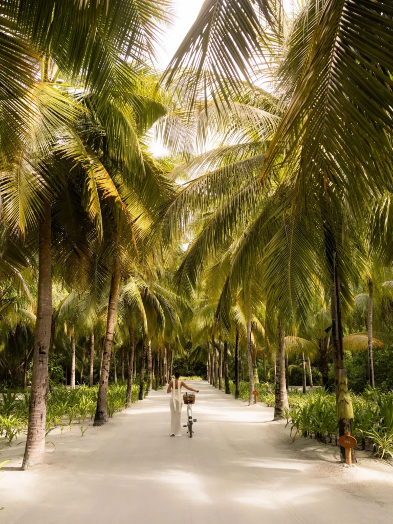 Exploring the lush tropical island of One&Only Reethi Rah on foot or by bicycle