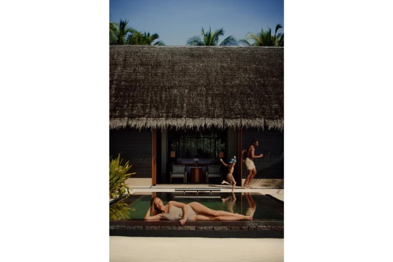 Beach villa private pool at One&Only Reethi Rah with palm trees and tropical garden
