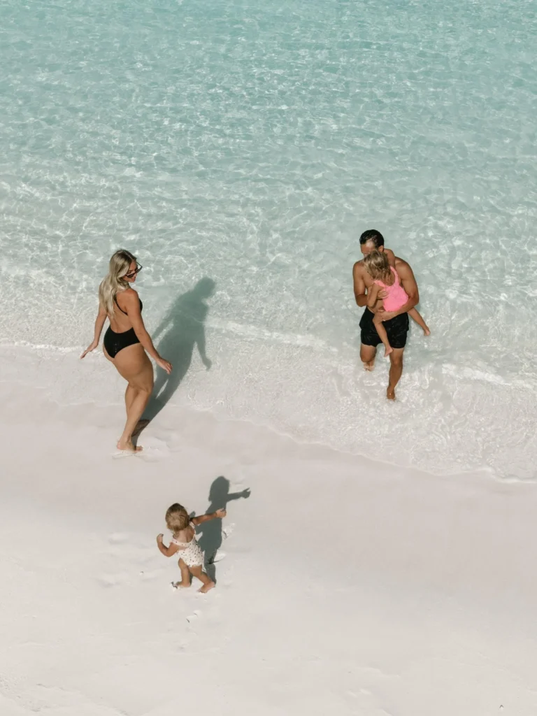 A family enjoying island life together at One&Only Reethi Rah