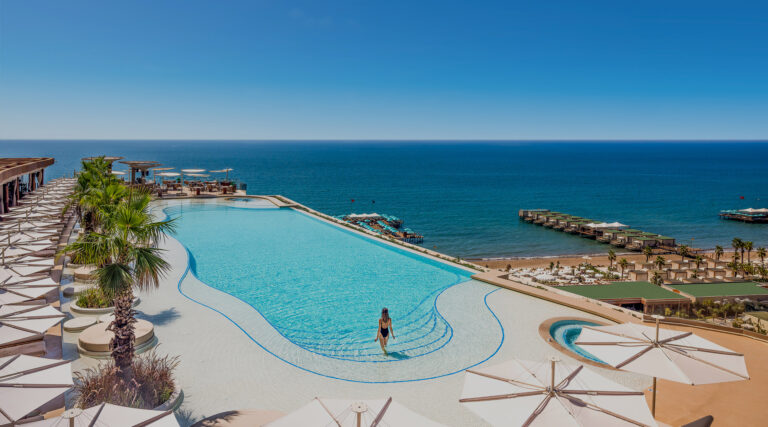 Seven Rooftop Pool infinity edge over the Mediterranean at Regnum The Crown