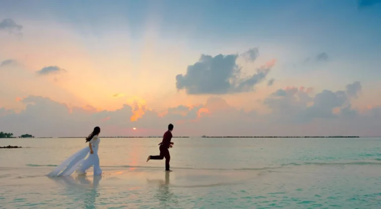 Couple on the beach at sunset, Shangri-La Mactan, Cebu