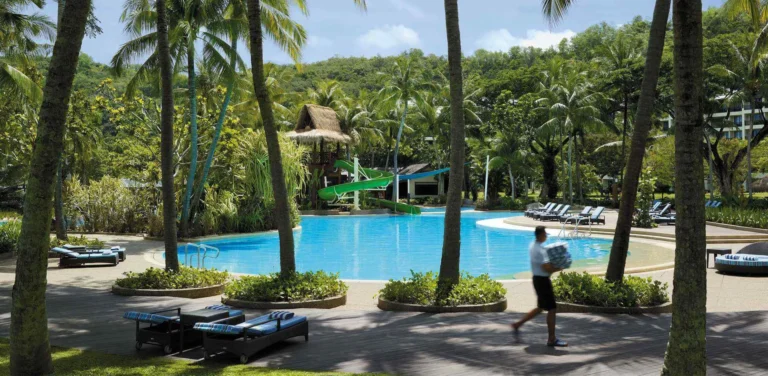 Resort facilities overview at Shangri-La Rasa Ria showing pools and tropical gardens