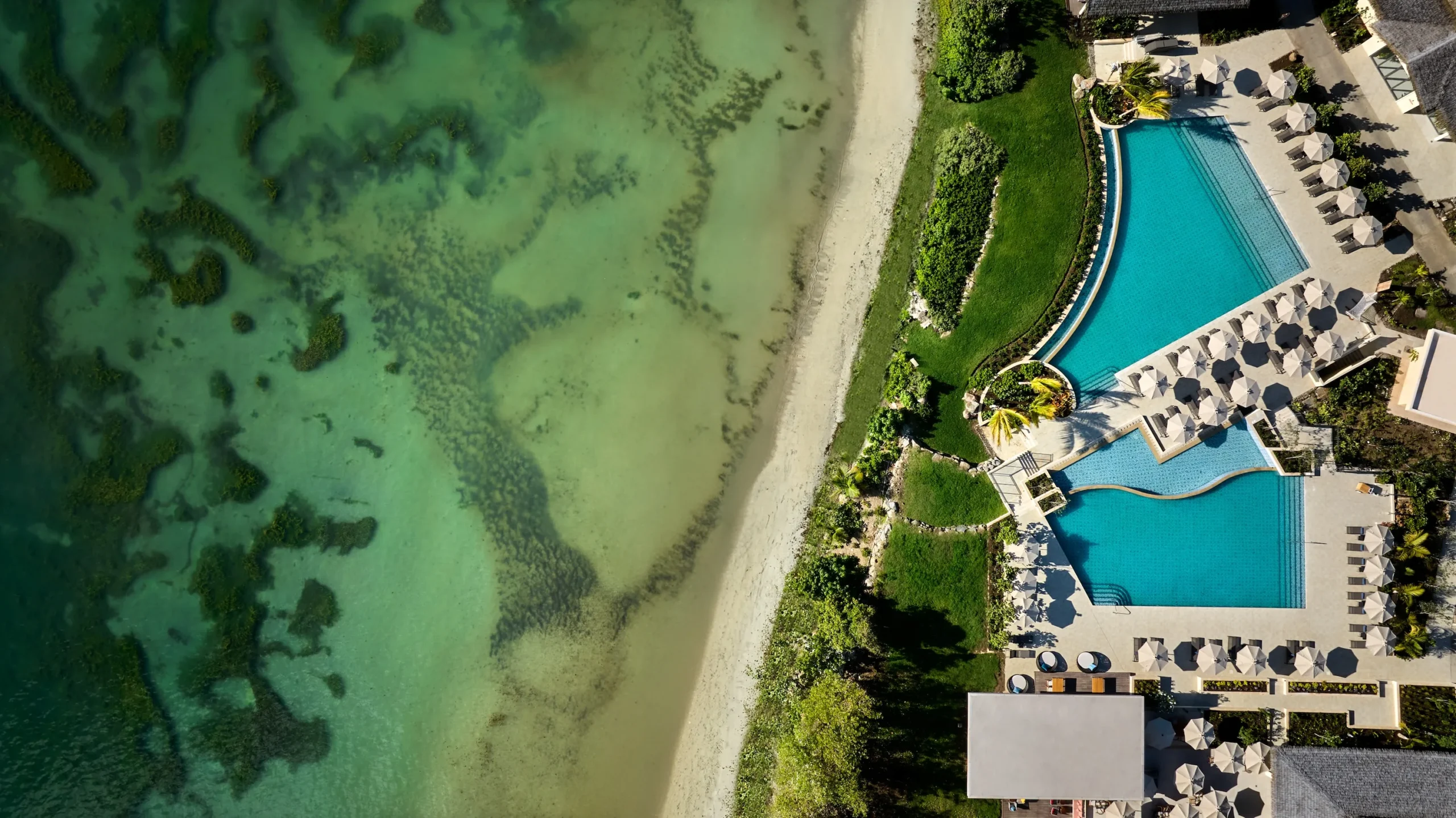 Aerial view of Six Senses La Sagesse resort overlooking the Caribbean Sea, Grenada
