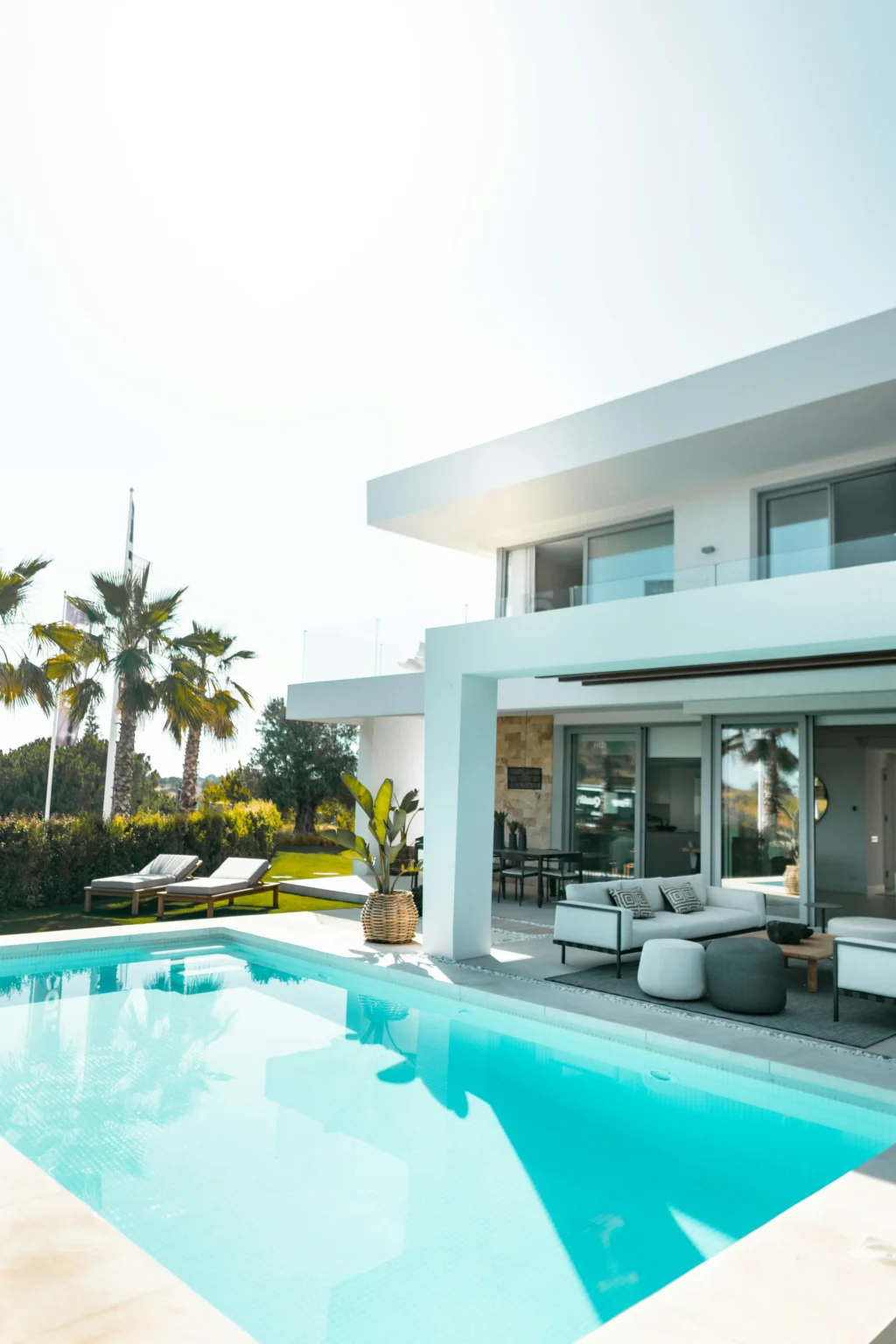 Private villa with white concrete architecture and its own pool