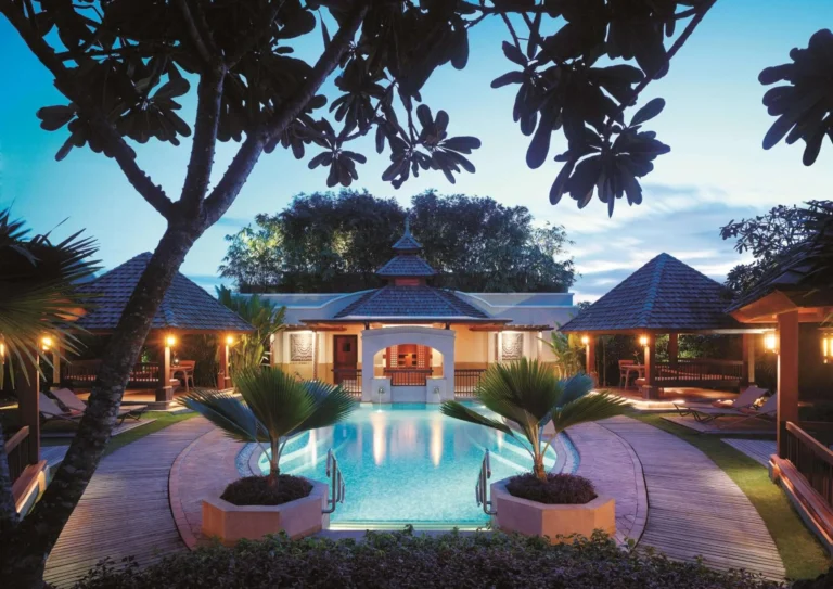 Poolside view of the resort's guest wings at Shangri-La Mactan, Cebu