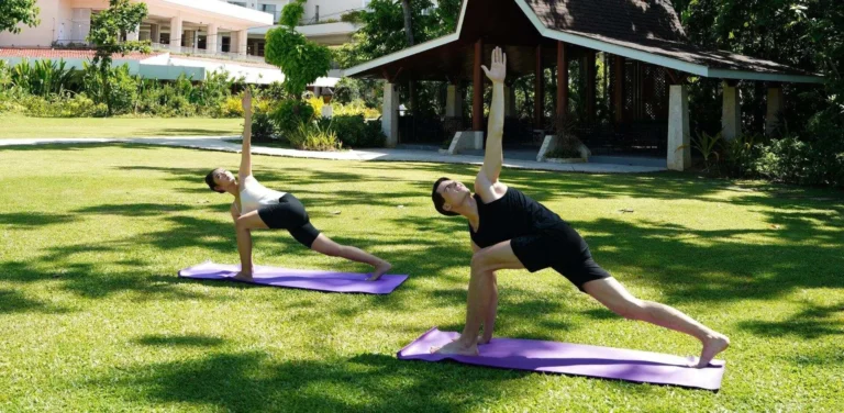 Guests practising yoga on the resort's lawn as part of the daily activities programme at Shangri-La Mactan, Cebu