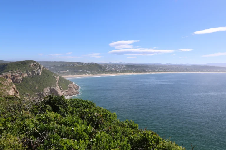 The Robberg peninsula and the long sweep of Plettenberg Bay beach seen from the coastal path
