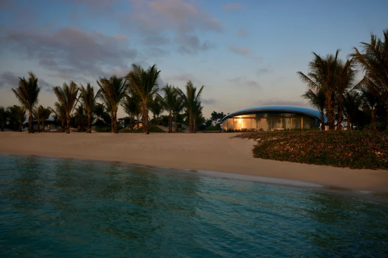 Aerial view of Shebara Resort overwater orb villas reflecting the Red Sea on Sheybarah Island