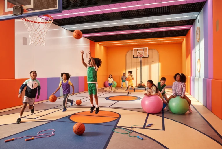 Children playing basketball at the Atlantis Explorers Club active zone
