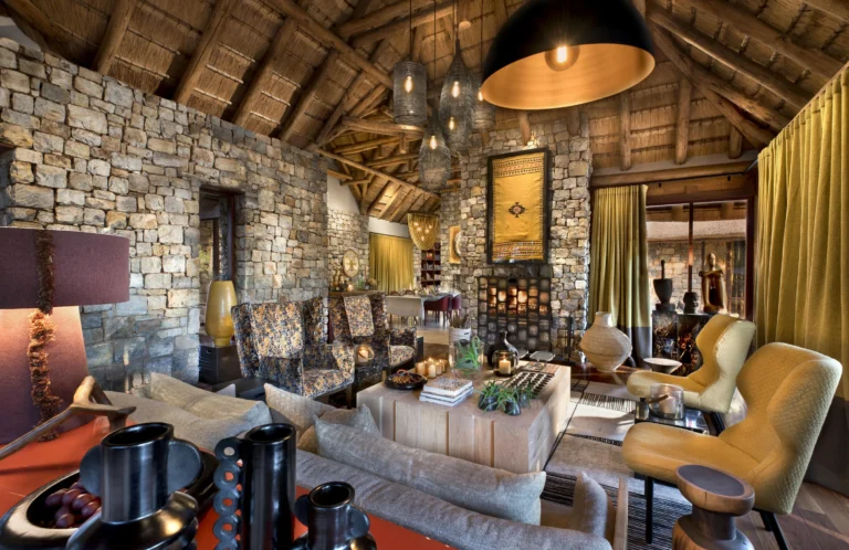 Morukuru Owner's House living room with safari-chic furnishings at Madikwe Game Reserve
