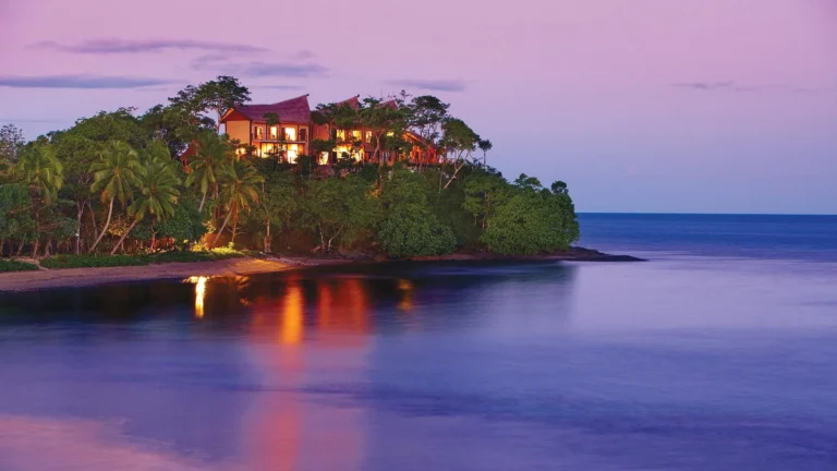 Nanuku Resort beachfront villas at golden hour, Fiji