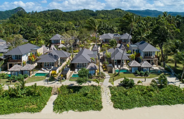 Aerial drone shot of beachfront villa at Nanuku Resort with private pool