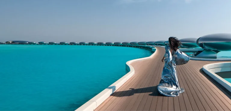 Wide panorama of Shebara Resort villa clusters and connecting jetties over the Red Sea