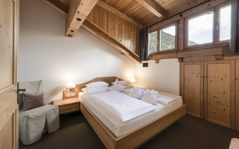 Suite interior at Cavallino Bianco Family Spa Grand Hotel