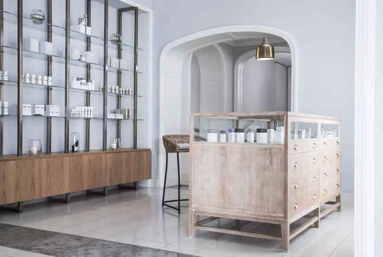 Guerlain Spa retail and reception area at One&Only Le Saint Géran — product displays, natural materials, calm atmosphere