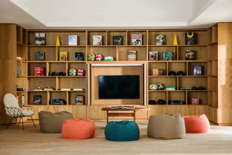 Club One 1Tribe teen lounge interior at One&Only Le Saint Géran — games, social spaces, bright contemporary design
