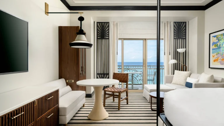 King guest room with modern coastal interiors