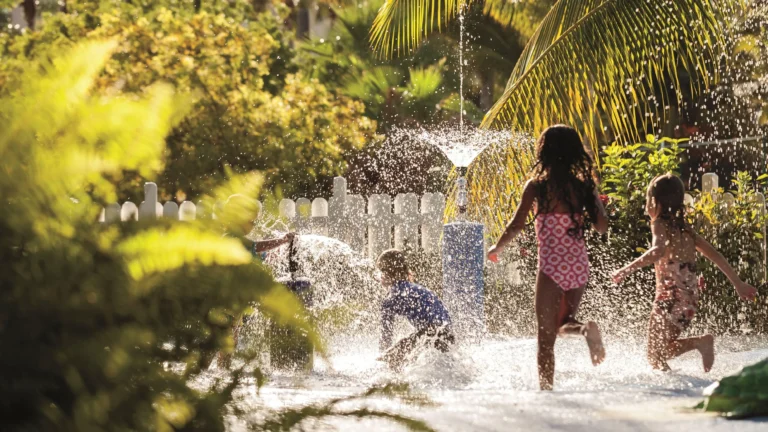 Children playing in the resort splash-pool area