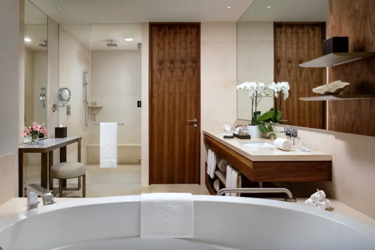 Ambassador Family Suite bathroom with soaking tub and double vanity at Grand Velas Los Cabos